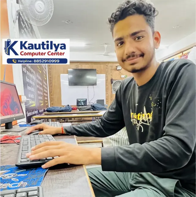 Student practicing computer skills on a desktop system at Kautilya Computer Center in Sikar